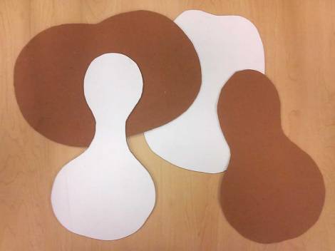 I created a series of organic shapes representing pumpkins and gourds to help students practice tracing shapes for a simple, yet fun, collage project.